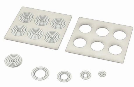 Flat cover with circular openings, concentric rings
